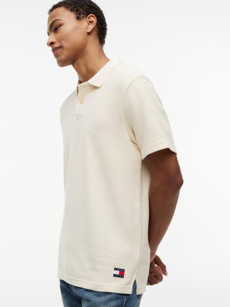 Afbeelding voor product Polo van het merk Tommy Jeans in het Beige
